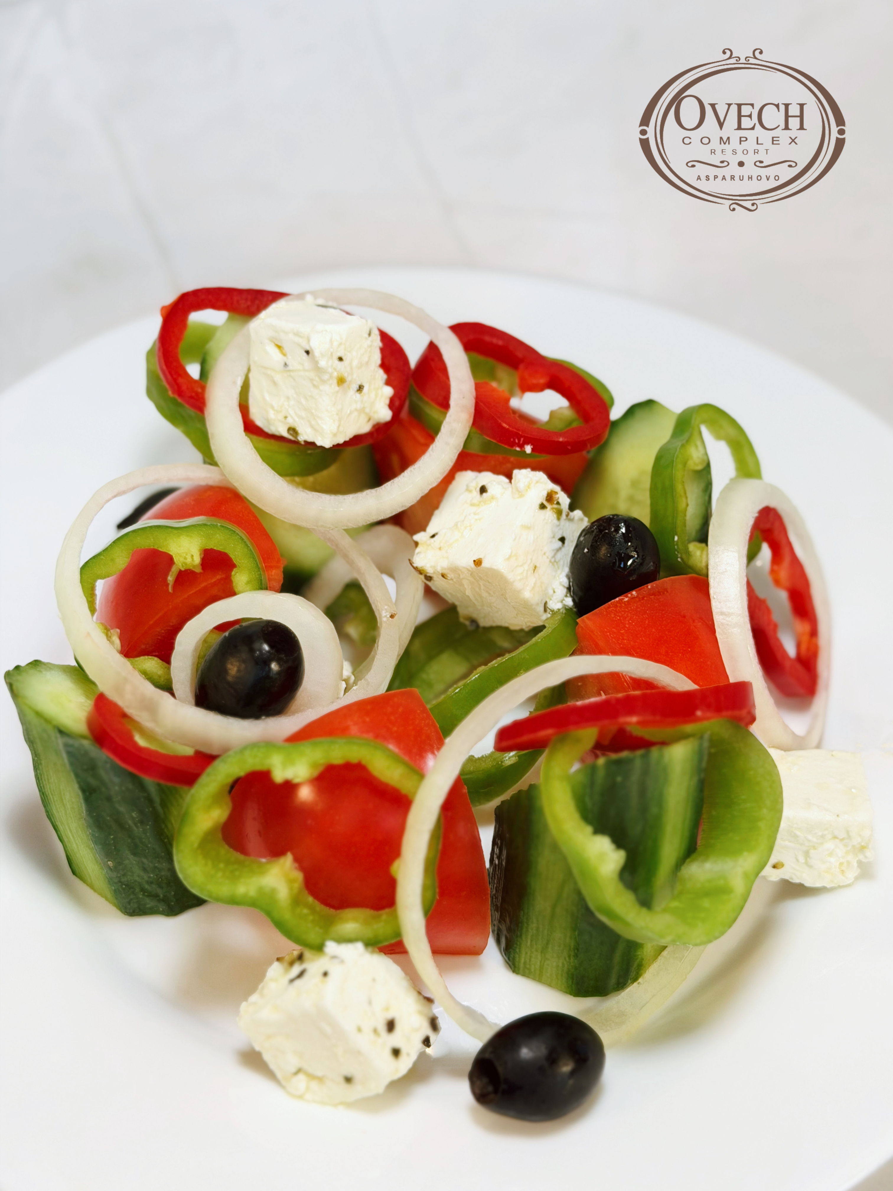 A main course with garnish and sauce