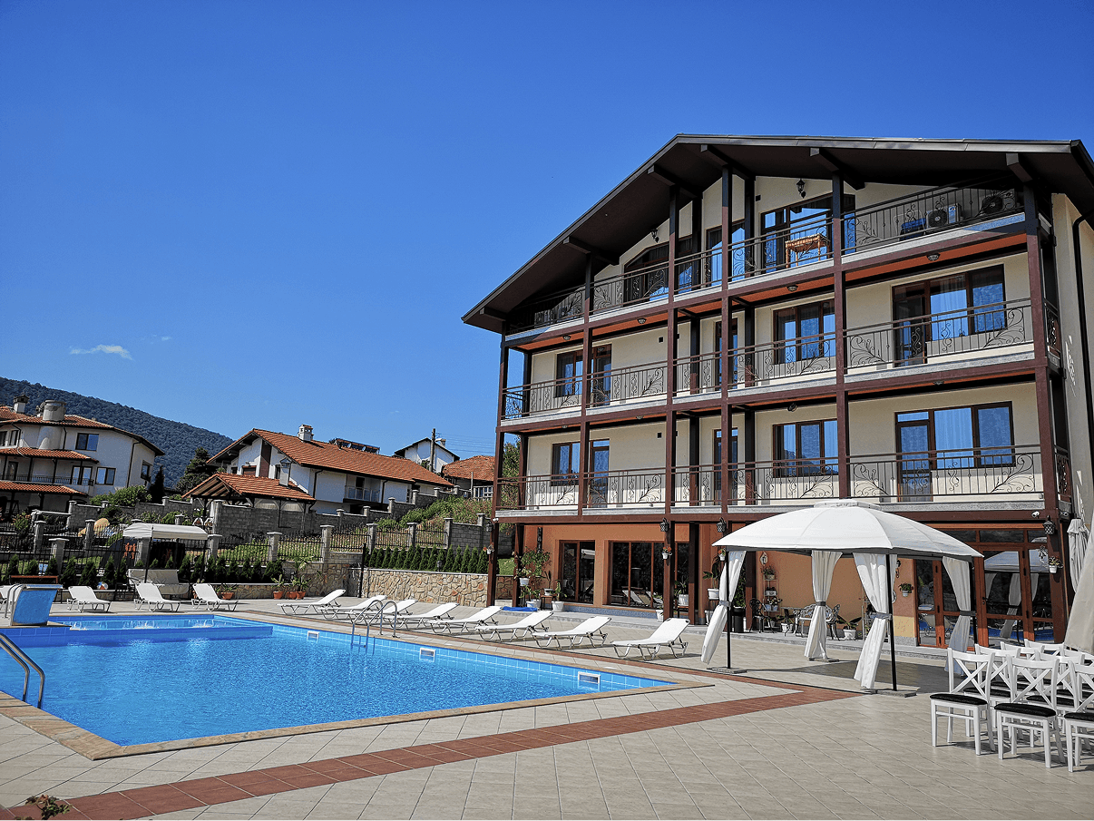 The hotel beside the pool at Ovech Resort Complex