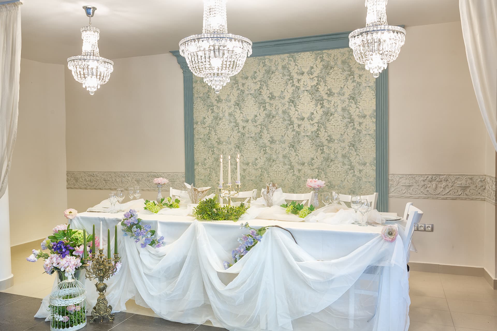 The newlyweds’ table laid in the main restaurant